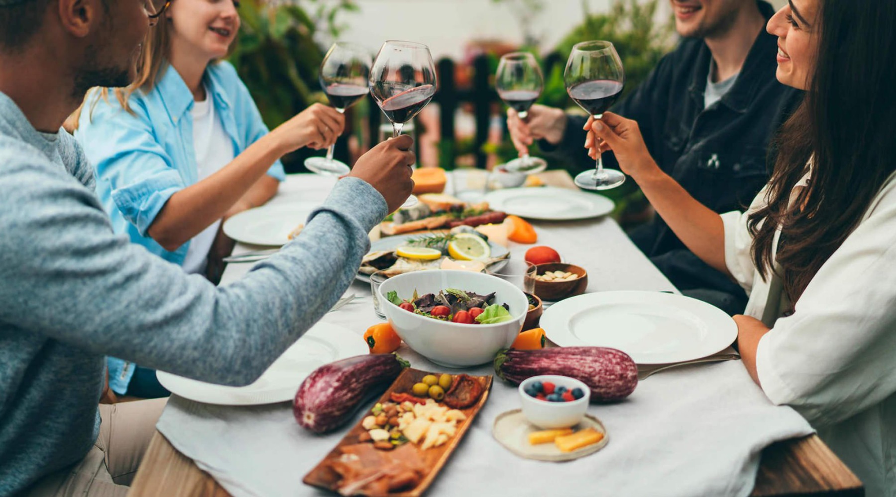 People having dinner together